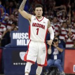Arizona guard Gabe York reacts after defeating Boise State 88-76 during an NCAA college basketball game, Thursday, Nov. 19, 2015, in Tucson, Ariz. (AP Photo/Rick Scuteri)