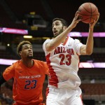 Arizona forward Mark Tollefsen, right, drives to the basket past Boise State forward James Webb III during the second half of an NCAA college basketball game at the Wooden Legacy tournament, Sunday, Nov. 29, 2015, in Anaheim, Calif. (AP Photo/Jae C. Hong)