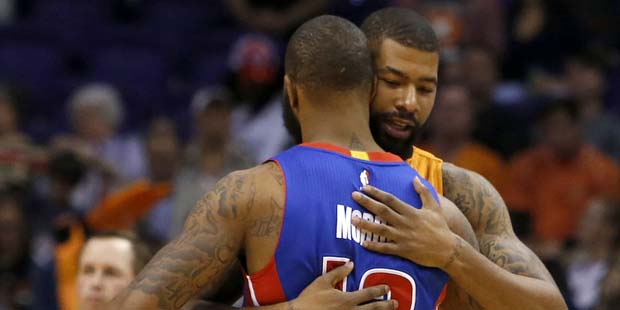 Phoenix Suns forward Markieff Morris and and his brother Detroit Pistons forward Marcus Morris (13)...