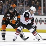 Arizona Coyotes' Max Domi, right, is defended by Anaheim Ducks' Ryan Kesler during the first period of an NHL hockey game, Monday, Nov. 9, 2015, in Anaheim, Calif. (AP Photo/Jae C. Hong)
