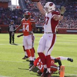 Arizona Cardinals tight end Troy Niklas (87) celebrates after an 11-yard touchdown pass in the first half of an NFL football game against the Cleveland Browns, Sunday, Nov. 1, 2015, in Cleveland. (AP Photo/Ron Schwane)