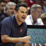 Arizona head coach Sean Miller directs his team during the first half of an NCAA college basketball game against Boise State at the Wooden Legacy tournament, Sunday, Nov. 29, 2015, in Anaheim, Calif. (AP Photo/Jae C. Hong)