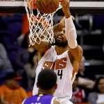 Phoenix Suns' Tyson Chandler (4) misses a dunk as Sacramento Kings' Rudy Gay (8) watches during the first half of an NBA basketball game, Wednesday, Nov. 4, 2015, in Phoenix. (AP Photo/Matt York)