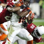 Cincinnati Bengals wide receiver Brandon Tate (19) is hit by Arizona Cardinals strong safety Tony Jefferson (22) during the first half of an NFL  football game, Sunday, Nov. 22, 2015, in Glendale, Ariz. (AP Photo/Rick Scuteri)