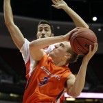 Boise State guard Anthony Drmic, front, looks to shoot as he is defended by Arizona forward Mark Tollefsen during the first half of an NCAA college basketball game at the Wooden Legacy tournament, Sunday, Nov. 29, 2015, in Anaheim, Calif. (AP Photo/Jae C. Hong)