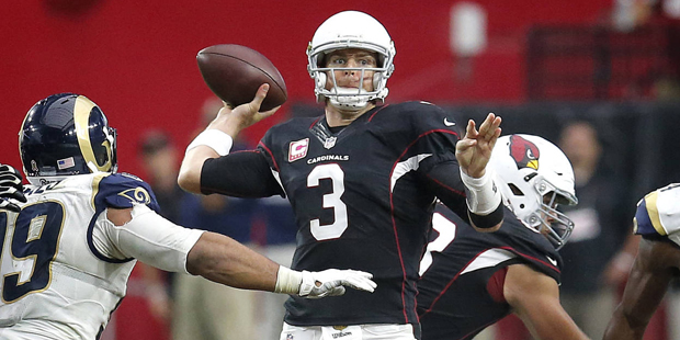 FILE - In this Oct. 4, 2015, file photo, Arizona Cardinals quarterback Carson Palmer (3) throws aga...