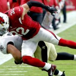 New Orleans Saints fullback Austin Johnson (35) is knocked out of bounds by Arizona Cardinals free safety Tyrann Mathieu (32) during the first half of an NFL football game, Sunday, Sept. 13, 2015, in Glendale, Ariz. (AP Photo/Rick Scuteri)