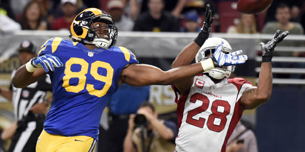Arizona Cardinals cornerback Justin Bethel, right, breaks up a pass intended for St. Louis Rams tig...