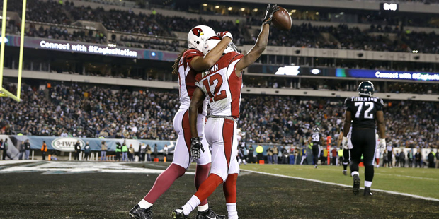 Arizona Cardinals' John Brown, right, and Larry Fitzgerald celebrate after Brown's touchdown during...