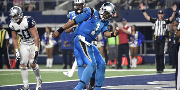 Carolina Panthers quarterback Cam Newton (1) celebrates after scoring a touchdown on a run as Dalla...