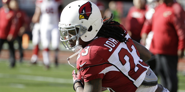 Arizona Cardinals running back Chris Johnson (23) warms up before an NFL football game against the ...