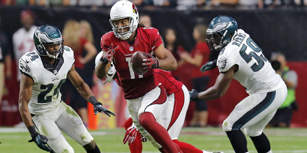 Arizona Cardinals wide receiver Larry Fitzgerald (11) breaks free for a touchdown run as Philadelph...