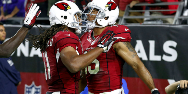 Arizona Cardinals wide receiver Michael Floyd (15) celebrates after scoring a touchdown against the...