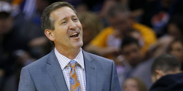 Phoenix Suns' Jeff Hornacek argues with officials during the first half of an NBA basketball game a...