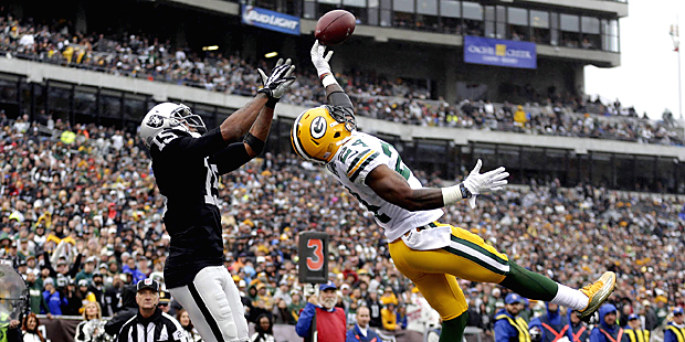 Green Bay Packers cornerback Quinten Rollins (24) breaks ups a pass intended for Oakland Raiders wi...