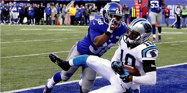 Carolina Panthers' Corey Brown (10) catches a pass for a touchdown in front of New York Giants' Tru...
