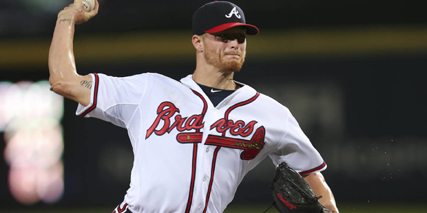 Atlanta Braves starting pitcher Shelby Miller works against the New York Mets in the first inning o...