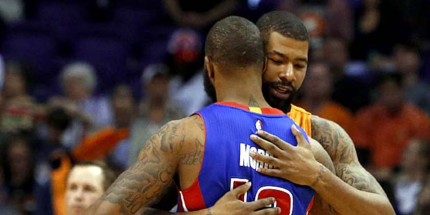 Phoenix Suns forward Markieff Morris and and his brother Detroit Pistons forward Marcus Morris (13)...