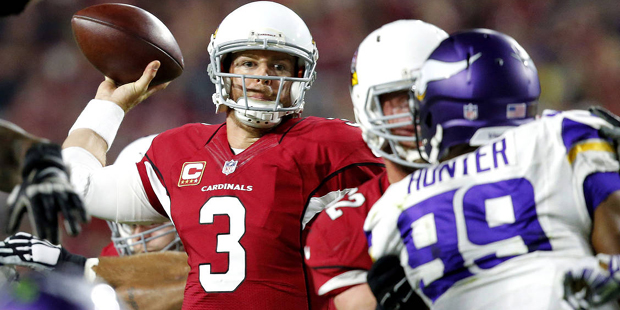 Arizona Cardinals quarterback Carson Palmer (3) throws against the Minnesota Vikings during the fir...