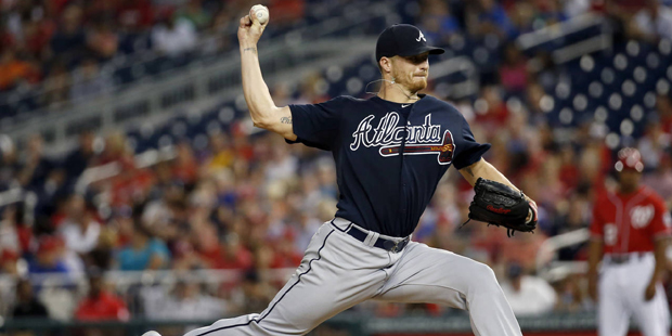 Atlanta Braves starting pitcher Shelby Miller throws during the third inning of a baseball game aga...