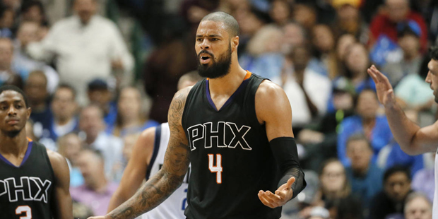 Phoenix Suns center Tyson Chandler looks for an explanation from an official on a foul called again...