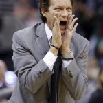 Utah Jazz coach Quin Snyder shouts to his team during the second half of an NBA basketball game against the Phoenix Suns on Monday, Dec. 21, 2015, in Salt Lake City. The Jazz won 110-89. (AP Photo/Rick Bowmer)