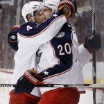 Columbus Blue Jackets' Brandon Saad (20) celebrates his goal against the Arizona Coyotes with Kevin Connauton (4) during the first period of an NHL hockey game, Thursday, Dec. 17, 2015, in Glendale, Ariz. (AP Photo/Ross D. Franklin)
