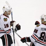 Chicago Blackhawks' Jonathan Toews (19) celebrates his goal against the Arizona Coyotes with Teuvo Teravainen (86), of Finland, during the third period of an NHL hockey game Tuesday, Dec. 29, 2015, in Glendale, Ariz. The Blackhawks won 7-5. (AP Photo/Ross D. Franklin)