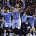 Denver Nuggets' Randy Foye (4) celebrates a 3-pointer he scored against the Phoenix Suns during the second half of an NBA basketball game Wednesday, Dec. 23, 2015, in Phoenix. The Nuggets defeated the Suns 104-96. (AP Photo/Ross D. Franklin)