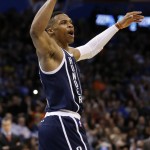 Oklahoma City Thunder guard Russell Westbrook gestures to the crowd following a basket in the second quarter of an NBA basketball game against the Phoenix Suns in Oklahoma City, Thursday, Dec. 31, 2015. (AP Photo/Sue Ogrocki)