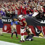 Arizona Cardinals wide receiver Michael Floyd (15) celebrates after scoring a touchdown against the Minnesota Vikings during the second half of an NFL football game, Thursday, Dec. 10, 2015, in Glendale, Ariz. (AP Photo/Ross D. Franklin)