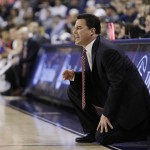 Arizona head coach Sean Miller instructs his team during the first half of an NCAA college basketball game against Gonzaga, Saturday, Dec. 5, 2015, in Spokane, Wash. (AP Photo/Young Kwak)