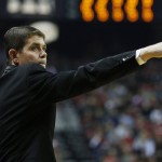 UNLV head coach Dave Rice motions to his players during the first half of an NCAA college basketball game against Arizona State Wednesday, Dec. 16, 2015, in Las Vegas. (AP Photo/John Locher)