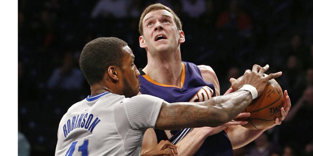 1 / 7

Brooklyn Nets forward Thomas Robinson (41) defends as Phoenix Suns forward Jon Leuer looks t...