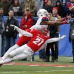 Arizona wide receiver Cayleb Jones,left, comes up short for a catch as he's defended by New Mexico cornerback Donnie Duncan, right, during the second half of the New Mexico Bowl NCAA college football game in Albuquerque, N.M., Saturday, Dec. 19, 2015. Arizona won 45-37. (AP Photo/Andres Leighton)