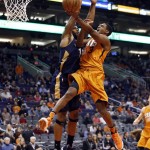 Phoenix Suns guard Brandon Knight (3) drives on New Orleans Pelicans forward Alonzo Gee during the fourth quarter of an NBA basketball game, Friday, Dec. 18, 2015, in Phoenix. The Suns won 104-88. (AP Photo/Rick Scuteri)