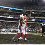 Arizona Cardinals' John Brown, right, and Larry Fitzgerald celebrate after Brown's touchdown during the second half of an NFL football game against the Philadelphia Eagles, Sunday, Dec. 20, 2015, in Philadelphia. (AP Photo/Matt Rourke)