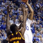 Kentucky's Marcus Lee, right, shoots while defended by Arizona State's Savon Goodman (11) during the second half of an NCAA college basketball game Saturday, Dec. 12, 2015, in Lexington, Ky. Kentucky won 72-58. (AP Photo/James Crisp)
