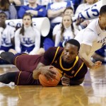 Kentucky's Isaiah Briscoe, right, and Arizona State's Willie Atwood dive for a loose ball during the first half of an NCAA college basketball game Saturday, Dec. 12, 2015, in Lexington, Ky.  (AP Photo/James Crisp)
