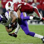Minnesota Vikings wide receiver Jarius Wright (17) is tackled by Arizona Cardinals free safety Tyrann Mathieu (32) during the first half of an NFL football game, Thursday, Dec. 10, 2015, in Glendale, Ariz. (AP Photo/Ross D. Franklin)