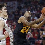 Arizona State guard Andre Spight shoots around UNLV forward Stephen Zimmerman Jr. during the first half of an NCAA college basketball game Wednesday, Dec. 16, 2015, in Las Vegas. (AP Photo/John Locher)