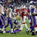 Minnesota Vikings running back Adrian Peterson (28) sits on the turf after fumbling against the Arizona Cardinals during the second half of an NFL football game, Thursday, Dec. 10, 2015, in Glendale, Ariz. The Cardinals recovered the ball. (AP Photo/Ross D. Franklin)
