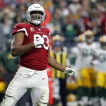 Arizona Cardinals defensive end Calais Campbell (93) celebrates a defensive stop against the Green Bay Packers during the first half of an NFL football game, Sunday, Dec. 27, 2015, in Glendale, Ariz. (AP Photo/Rick Scuteri)