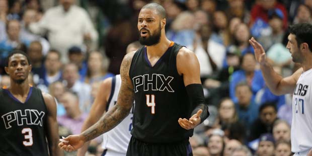 Phoenix Suns center Tyson Chandler looks for an explanation from an official on a foul called again...