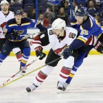 St. Louis Blues defenseman Colton Parayko, right,  competes for the puck against Arizona Coyotes right wing Tobias Rieder in second period of an NHL hockey game Tuesday, Dec. 8, 2015, in St. Louis. (Chris Lee/St. Louis Post-Dispatch via AP)  EDWARDSVILLE INTELLIGENCER OUT; THE ALTON TELEGRAPH OUT; MANDATORY CREDIT