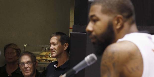 Phoenix Suns' Markieff Morris, right, answers questions during a news conference as head coach Jeff...