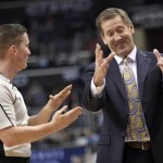 Phoenix Suns head coach Jeff Hornacek, right, gestures to referee Nick Buchert, left, during the first half of an NBA basketball game against the Washington Wizards, Friday, Dec. 4, 2015, in Washington. (AP Photo/Nick Wass)