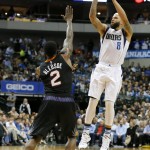 Phoenix Suns guard Eric Bledsoe (2) defends as Dallas Mavericks guard Deron Williams (8) goes up for a shot in the first half of an NBA basketball game, Monday, Dec. 14, 2015, in Dallas. (AP Photo/Tony Gutierrez)