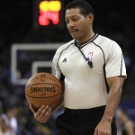 NBA referee Bill Kennedy holds the game ball during the first half of a basketball game between the Golden State Warriors and the Phoenix Suns on Wednesday, Dec. 16, 2015, in Oakland, Calif. (AP Photo/Ben Margot)