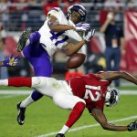 Minnesota Vikings Anthony Harris (41) breaks up a pass intended for Arizona Cardinals wide receiver John Brown (12) during the second half of an NFL football game, Thursday, Dec. 10, 2015, in Glendale, Ariz. (AP Photo/Ross D. Franklin)